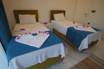 Villa Uysal Parla Işığı | Fethiye Merkezde 3 Yatak Odalı ve Geniş Bahçeli Tatil Villası (1048)